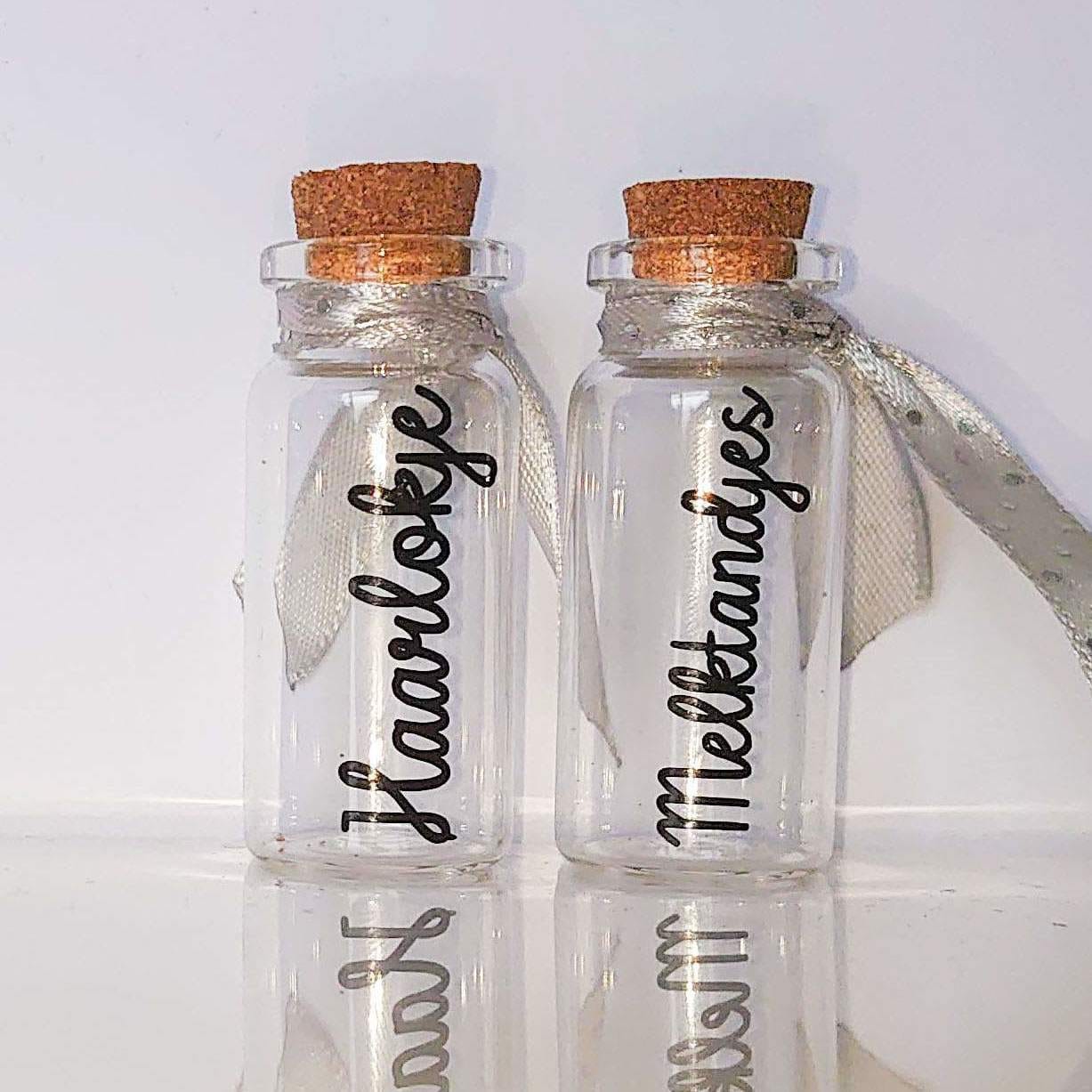 Set bewaarflesjes haarlokje en melktandjes